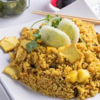 Pineapple Fried Rice · Wok fried with egg, cashew nuts,. raisins and fresh pineapple