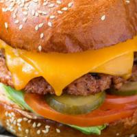 Beyond Burger · Brioche Bun – Double Melted Cheddar – Lettuce – Tomato – Caramelized Onions – Pickles – Thou...