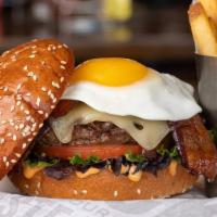 Gastropub Burger · Sesame Brioche Bun – Double Melted Swiss – Sunny-Side Up Egg – Bacon Caramelized Onions – Ba...