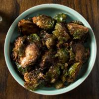 Brussels Sprouts · Pomegranate molasses, garlic  (add bacon +3). (GF)