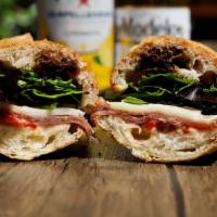 Milan Salami Sandwich · Our Italian Salami is served with Provolone Cheese, fresh Baby Mixed Greens, Virgin Olive Oi...