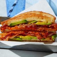 The Bacon Avocado · Melted Cheddar and Swiss cheese with bacon and avocado grilled between two slices of buttere...