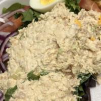 Albacore Tuna Salad · Our homemade albacore tuna salad, mixed greens, tomato, cheese and your choice of dressing.