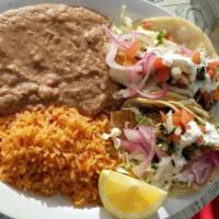2 Pieces Fish Tacos Plate · Served with rice and beans.
