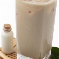 Kuro Milk Tea · It is a strong and full-bodied tea that pairs beautifully with our house milk. . 600ml / 20oz.