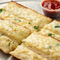 Garlic Bread · fresh baked baguette with housemade garlic butter, and with side of marinara