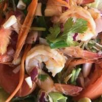 Prawns Salad · Grilled prawns, onions, cilantro, tomatoes, cucumbers and mint leaves tossed in a spicy lime...