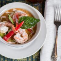 Red Curry · Red curry, coconut milk, green beans, red bell pepper, bamboo shoots and Thai basil.