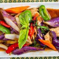 Spicy Eggplant · Stir fried eggplant, Thai basil, carrots, bell pepper and onions.