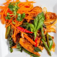 Spicy Catfish · Catfish stir fried with basil, red and green bell peppers with a spicy house sauce.