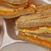 Breakfast Sandwich Turkey & Cheese · Scrambled Eggs, Turkey, Cheddar Cheese, Sourdough