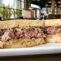 Ultimate Patty Melt · grilled angus beef patty, sweet caramelized onions, melted gruyère, mozzarella, and pub must...