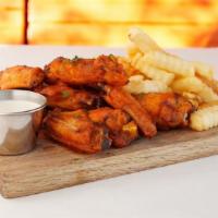 Organic Wings & Fries Combo · Comes with your choice of dipping sauce.