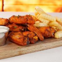 Organic Wings · Comes with your choice of sauce.