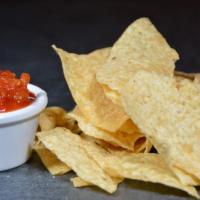 Chips & Salsa · Crispy corn tortilla chips with flavorful salsa.