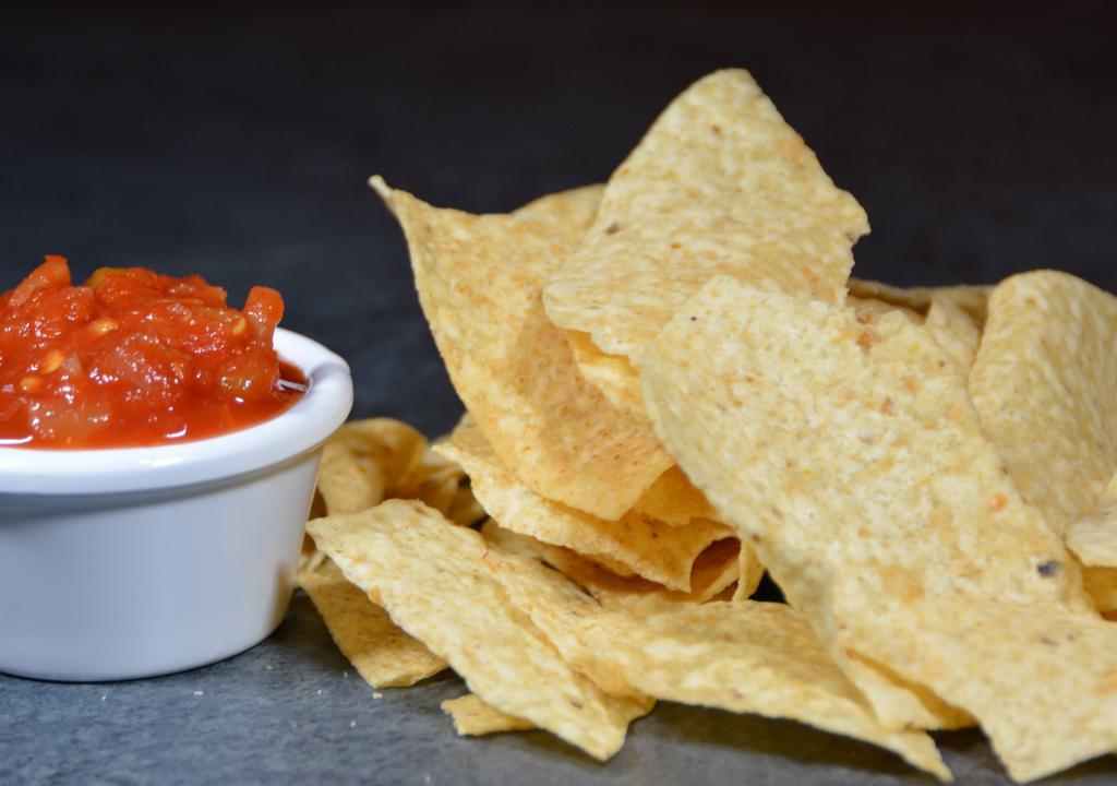 Chips & Salsa · Crispy corn tortilla chips with flavorful salsa.