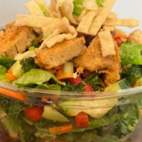 Sesame Ginger Salad · Kale, romaine, crispy tofu, carrot, cucumber, red pepper, wontons, sesame ginger dressing (s...