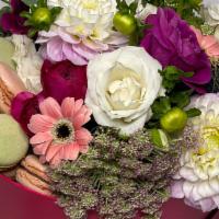 Bright Blooms & Macarons · Seasonal colorful blooms and macarons arranged in a floral box. 
Small box includes 3 macaro...