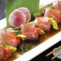 Yellowtail Special · 6 pcs / avocado, asparagus, and spicy tuna wrapped with fresh yellowtail sashimi