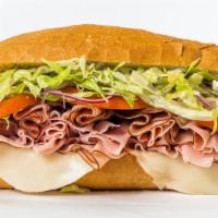 Ham Sub W/Cheese · includes provolone cheese, mayonnaise, mustard, pickle, onion, pepperoncini, lettuce, tomato...