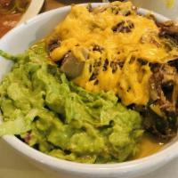 Machaca Bowl · Machaca served with guacamole and chips.