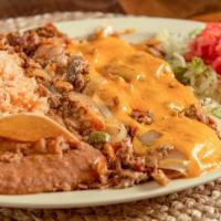#9 Machaca · Shredded beef with Sautéed onions, tomatoes, Jalapeños, eggs and melted cheddar cheese. Serv...