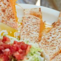 Flour Tortilla Quesadilla · Served with rice & beans.