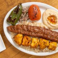 Adana & Chicken Combo · Adana(ground beef) and chicken kebab, rice, hummus, onions, grilled tomato, and pepper with ...