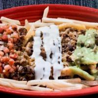 Iguana Fries · Fries topped with cheese, pico de gallo, sour cream, guacamole and your choice of meat.