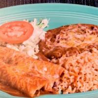 Enchilada Plate · hand made tortilla stuffed with melted cheese, your choice of meat, and enchilada sauce.