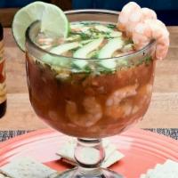 Coctel De Camaron · Shrimp mixed with pico de gallo, lime, avocado, and hot sauce in special cocktail sauce.