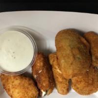 Jalapeño Poppers · 6 pieces. Cream cheese-filled. Comes with ranch.