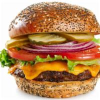 Classic Cheeseburger · USDA choice beef, lettuce, onion, tomato with cheese.