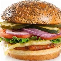 Veggie Burger · Vegetable patty made with mushrooms, water chestnuts, carrots, onions, green & red peppers &...