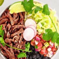 Ground Beef Burrito Bowl · Shredded beef, rice, black beans, pico de gallo, lettuce