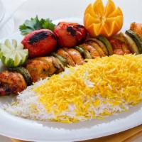 Chicken Shish Kabob · Thick chunks of charbroiled chicken breast, marinated in our special sauce with bell peppers...