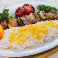 Shish Kabob · Thick chunks of filet mignon marinated, skewered and served with charbroiled onion, bell pep...