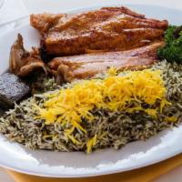 Trout Fish · A whole, fresh trout fish marinated and fried, served with sabzi polo rice topped with saffr...