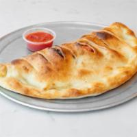 Spinach Onion Calzone · costumer's favorite 
made with our homemade dough filled with fresh  ingredient served with ...
