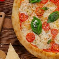 Margherita Pizza Special · Authentic Neapolitan pizza, delicious sauce sliced tomatoes fresh mozzarella cheese, topped ...