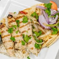 Chicken Souvlaki Plate · Favorite. Vegetarian. Marinated and charbroiled chicken tenders. Served on a bed of rice wit...