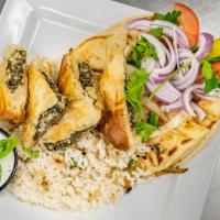 Spanakopita Plate · Vegetarian. Spinach, onions, feta and cottage cheese baked in filo. Served on a bed of rice ...