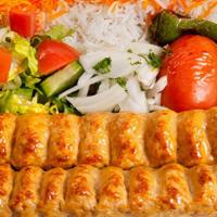 Chicken Lule Plate · Marinated minced chicken formed on a skewer and grilled. Served with rice, garden salad, gri...