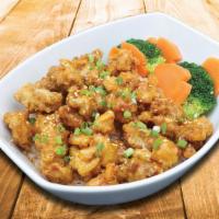 Orange Chicken Bowl · Served over jasmine rice carrots and broccoli.