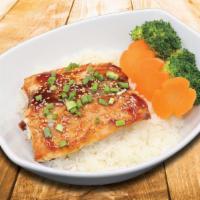 Salmon Teriyaki Bowl · Served over jasmine rice carrots and broccoli.