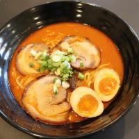 Chicken Ramen · Creamy chicken flavor broth top with katsu chicken and green onion.