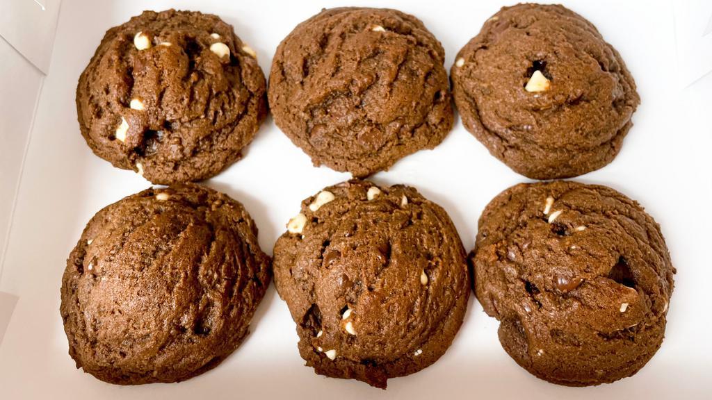12 Triple Chocolate Cookies · A chocolate cookie filled with semi-sweet chocolate, dark chocolate and white chocolate. Perfect for any chocolate lover!