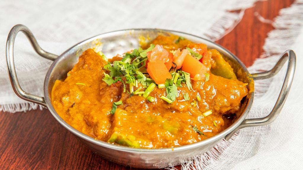 Rogan Josh / Lamb Curry · Gluten free. Boneless lamb cooked in simmered onion-tomato, ginger, garlic, and spices.