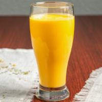 Mango Lassi · Homemade yogurt drink with mango.