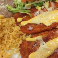 Two Enchiladas Dinner · Your choice of cheese, chicken, or beef enchiladas, topped with red or green sauce.